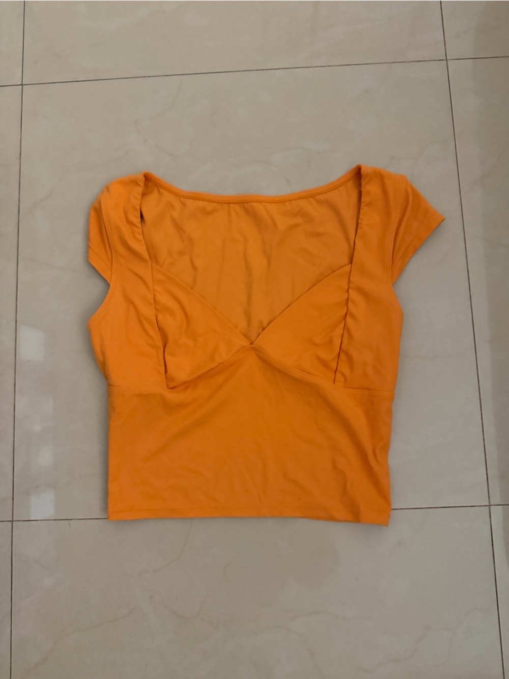 Orange crop top